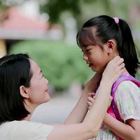 Mom sending daughter to school