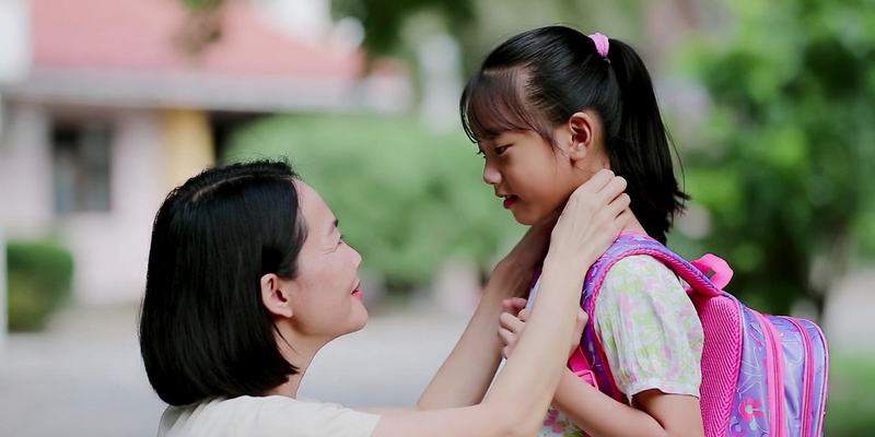Mom sending daughter to school