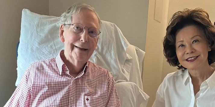 Senator_Mitch_McConnell_in_hospital_bed_beside_former_Transportation_Secretary_Elaine_Chao