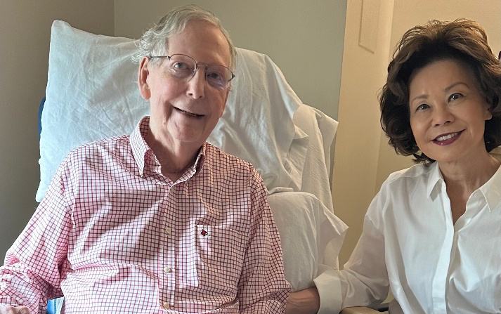 Senator_Mitch_McConnell_in_hospital_bed_beside_former_Transportation_Secretary_Elaine_Chao