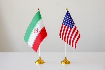 USA Iran Flags - Shutterstock